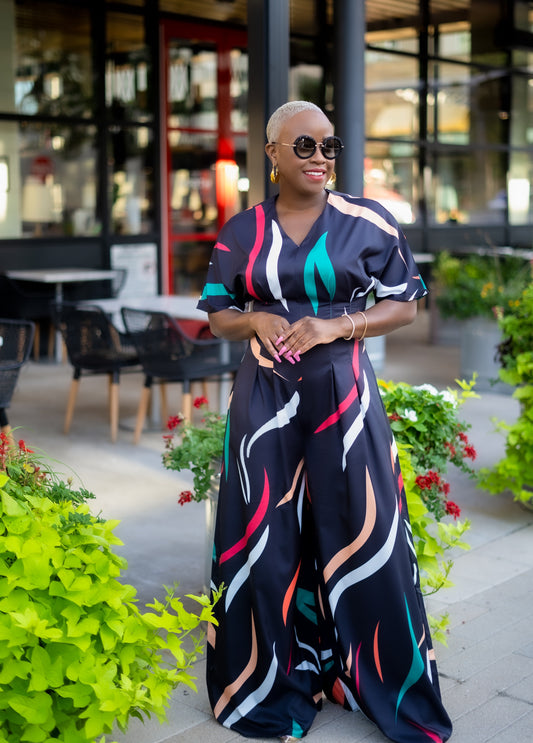 PLUS SIZE—Wide Legged Abstract Print Jumpsuit (Black)—Will Ship The Week Of 9/2/25